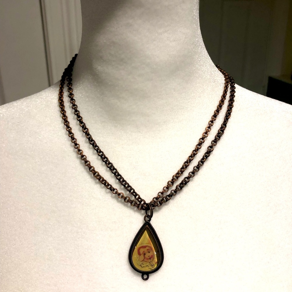 Vintage crying clown necklace